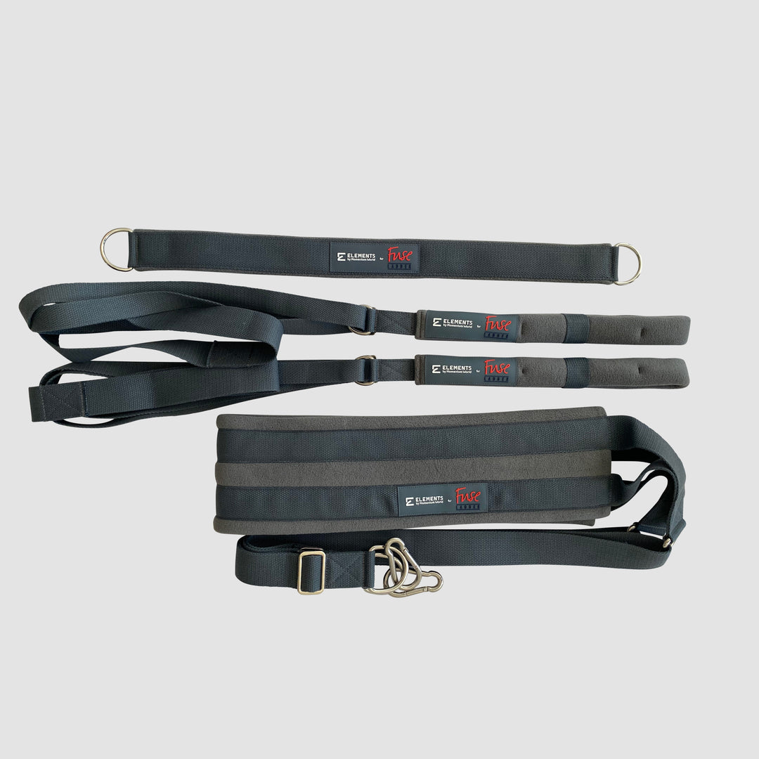 Fuse Ladder accessories include circus straps with loops, connector straps with d-rings, and yoga wall yoga sling with straps and d-rings.