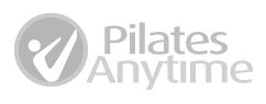Pilates Anytime logo, person stretching fingers to toes white silhouette on gray circle to left of "Pilates Anytime" in gray-tone