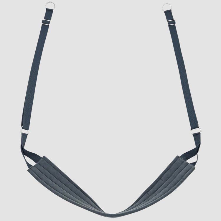The Fuse Ladder yoga wall yoga sling/yoga swing is padded and has attached adjustable straps and d-rings.